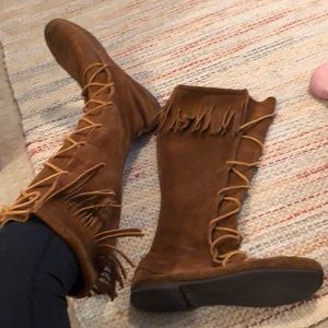 Minnetonka knee-high lace up fringe boots